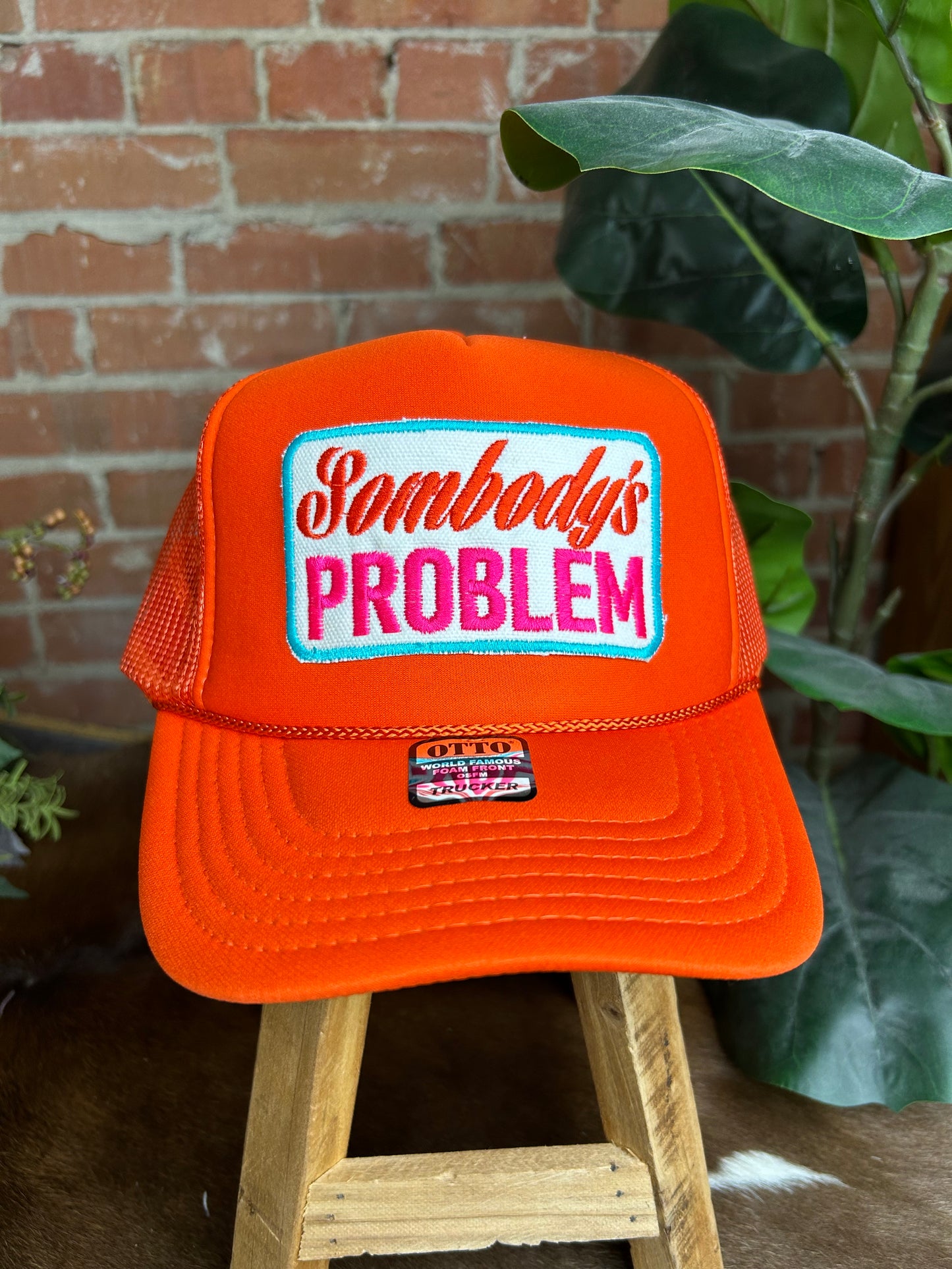 Somebody'd Problem Trucker Cap